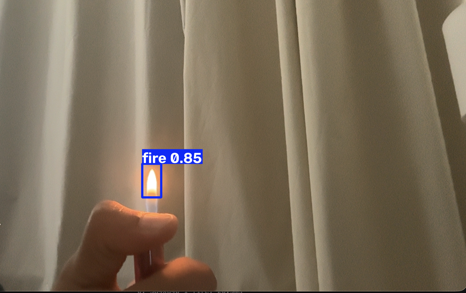 Model inference output — fire detection bounding box